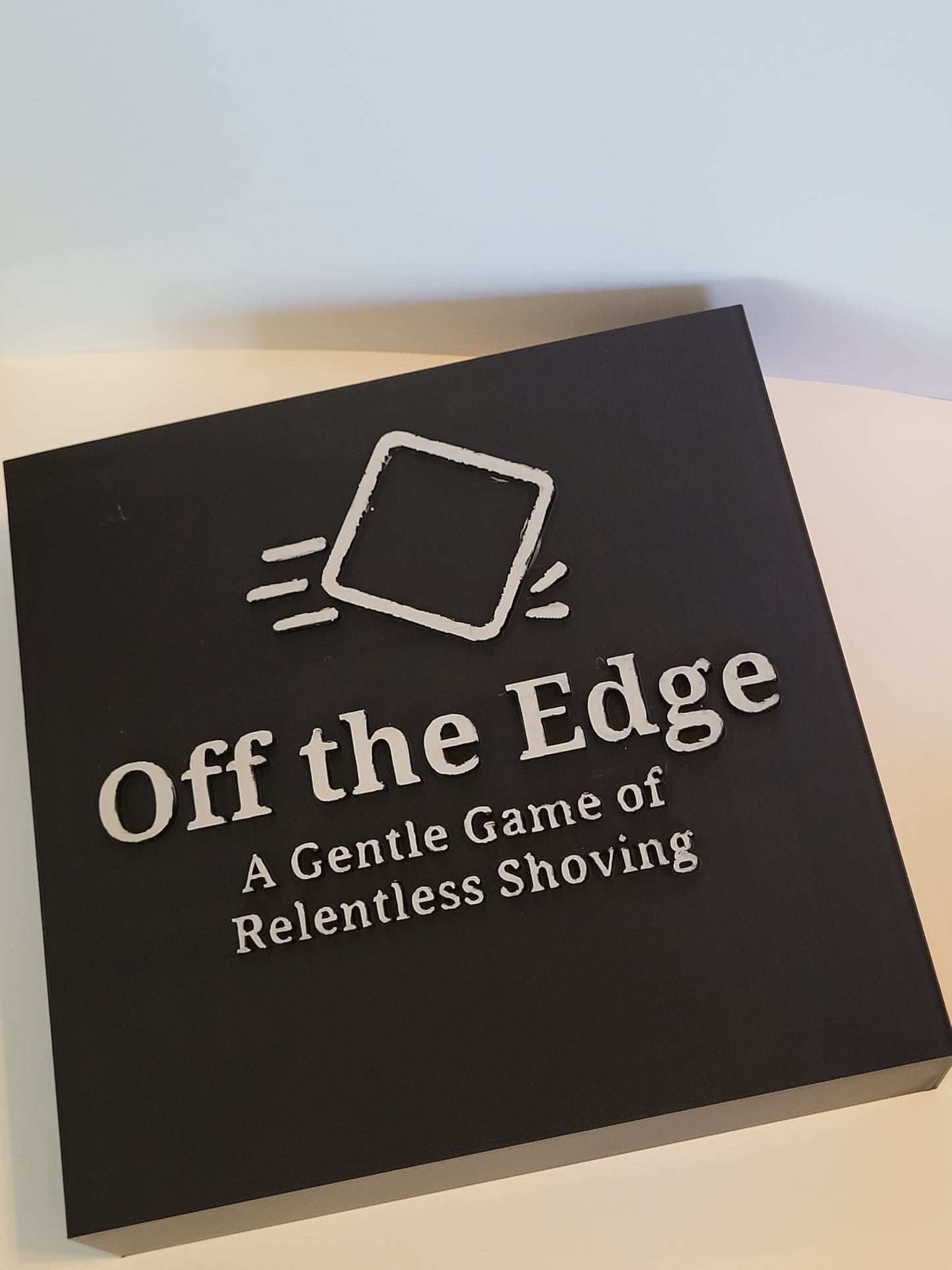 Off the Edge: A Gentle Game of Relentless Shoving