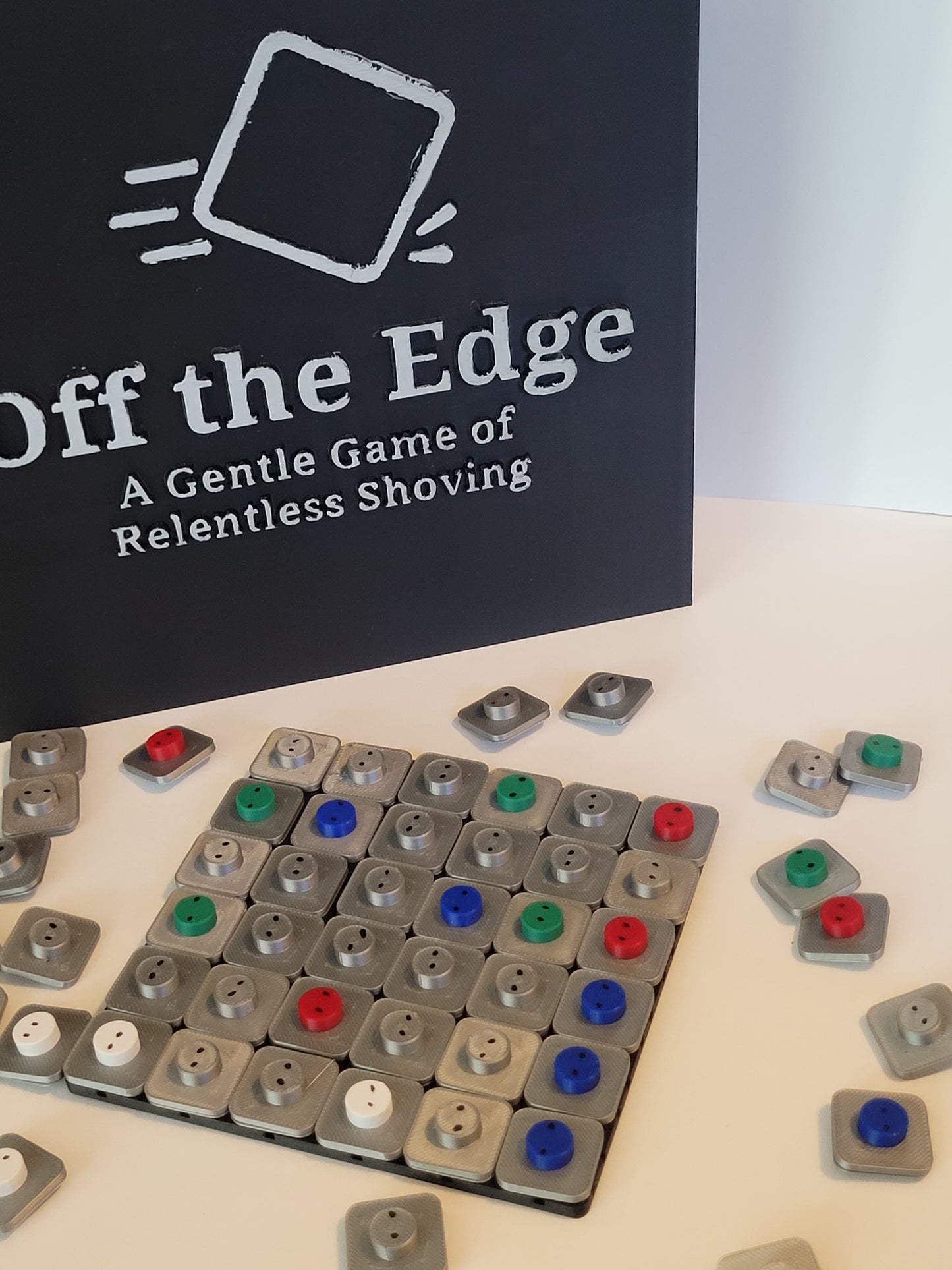 Off the Edge: A Gentle Game of Relentless Shoving
